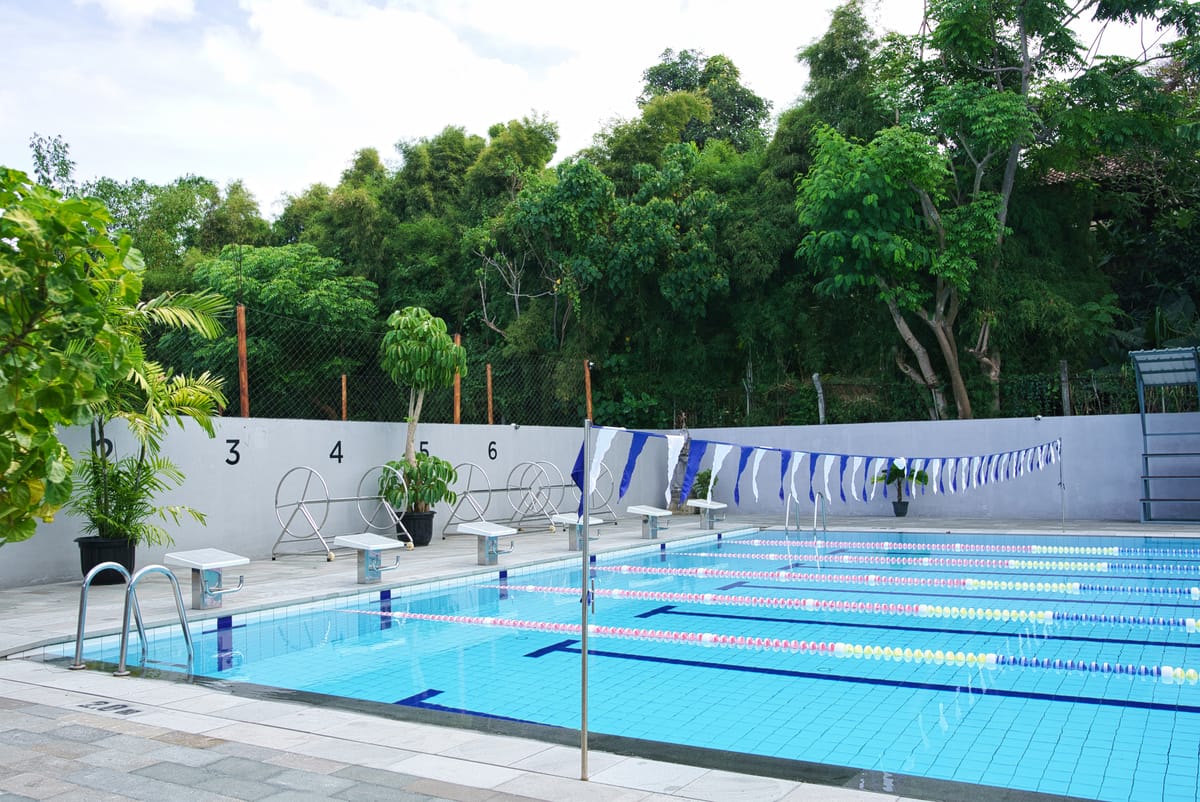 Wide view of a large institutional swimming pool